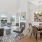 Spacious and well lit living room with adjacent dining area with access to the outdoor patio